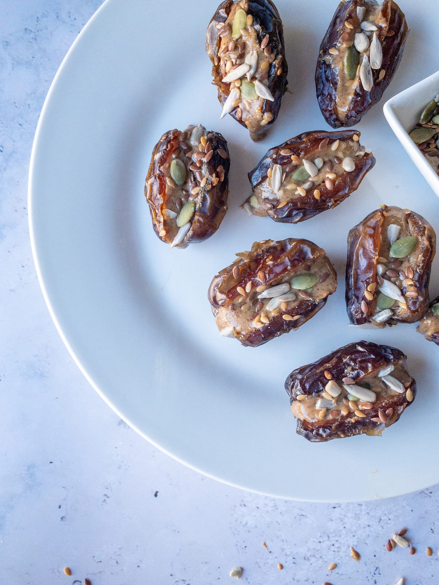 Nut butter stuffed dates with mixed seeds | The Gut Health Doctor