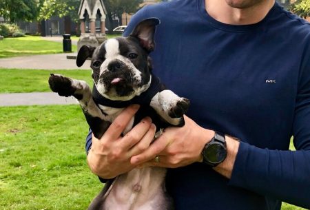 Man holding dog