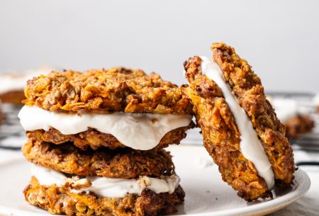 A photo of three of the carrot cookies of a plate