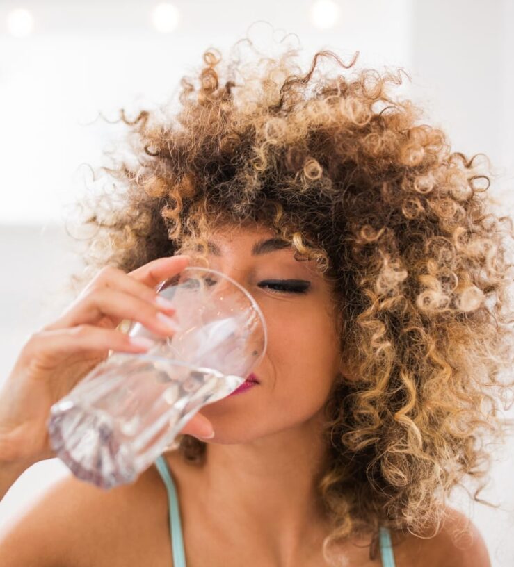 A woman drinking water