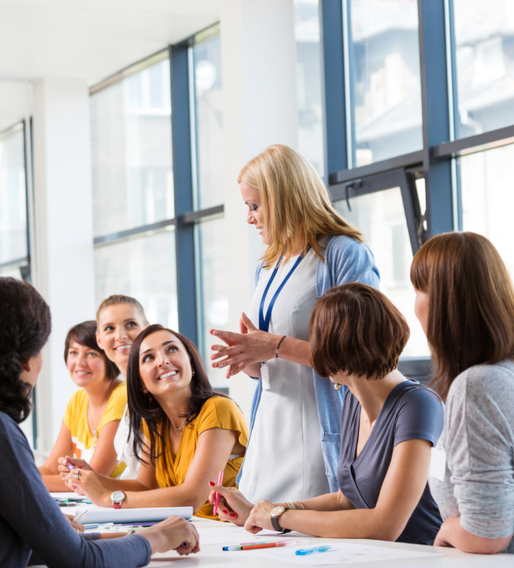 Photo of a woman presenting to show workplace wellbeing