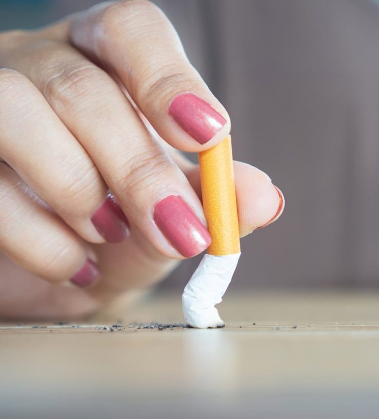 A photo of a cigarette being put out