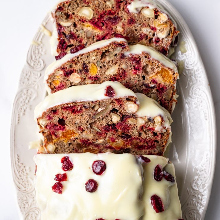 A photo of the trail mix cake sliced on a plate