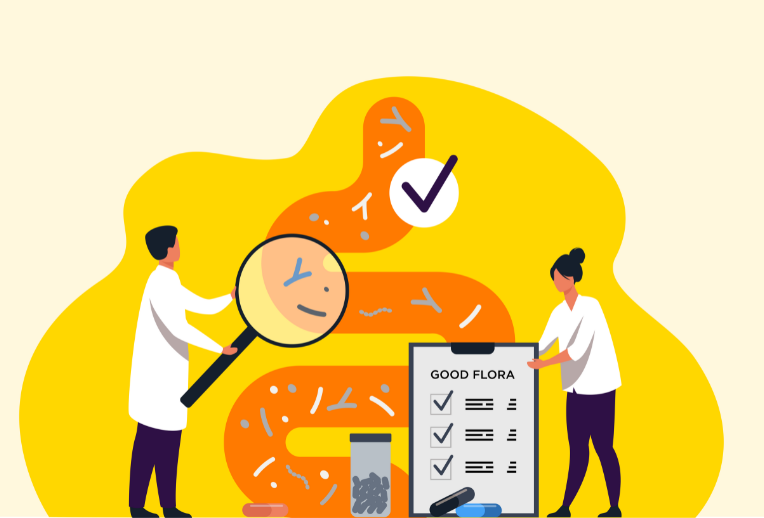 Dr Megan Rossi in a lab looking through a microscope